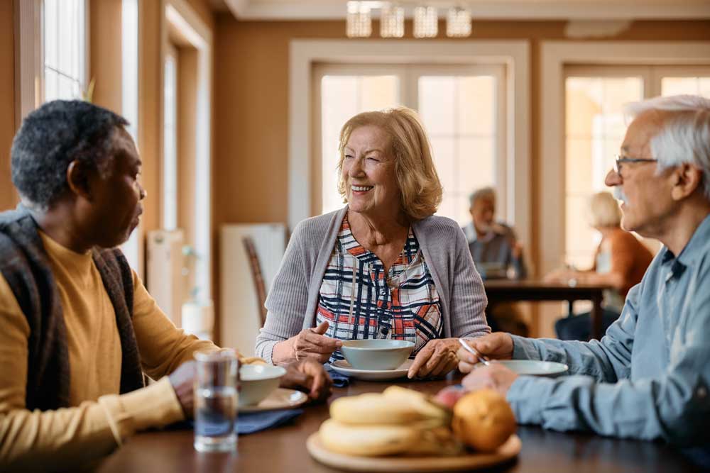 memory care, group eating at table